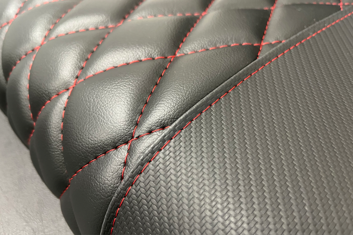 Black Carbon Fiber with Red Stitching